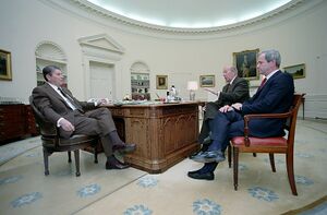 1985-04-01 President Ronald Reagan with George Shultz and Robert Mcfarlane in The Oval Office.jpg